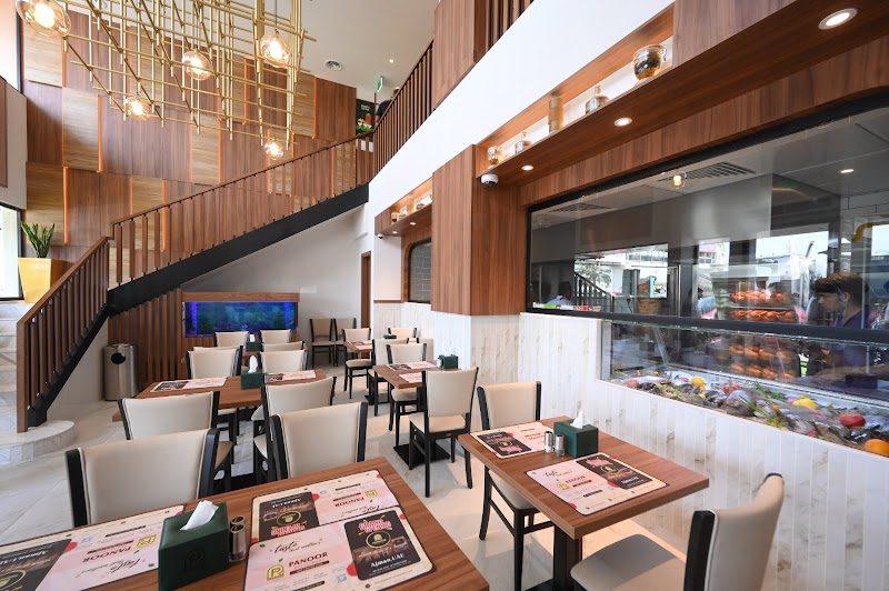 مطعم بانور عجمان مركز الحوّث